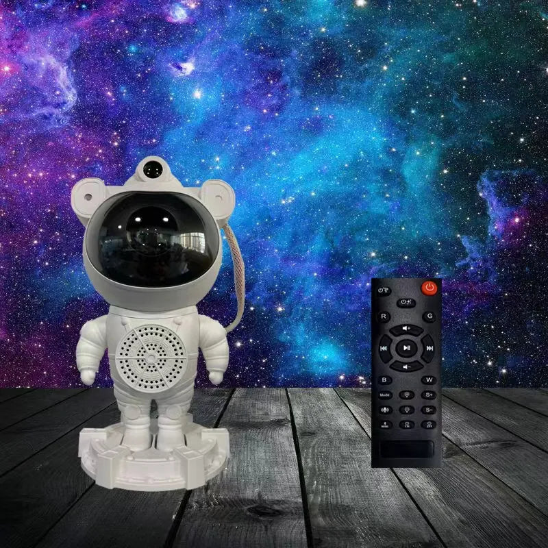 Astronauta Proyector con parlante Bluetooth + mini lámpara de regalo