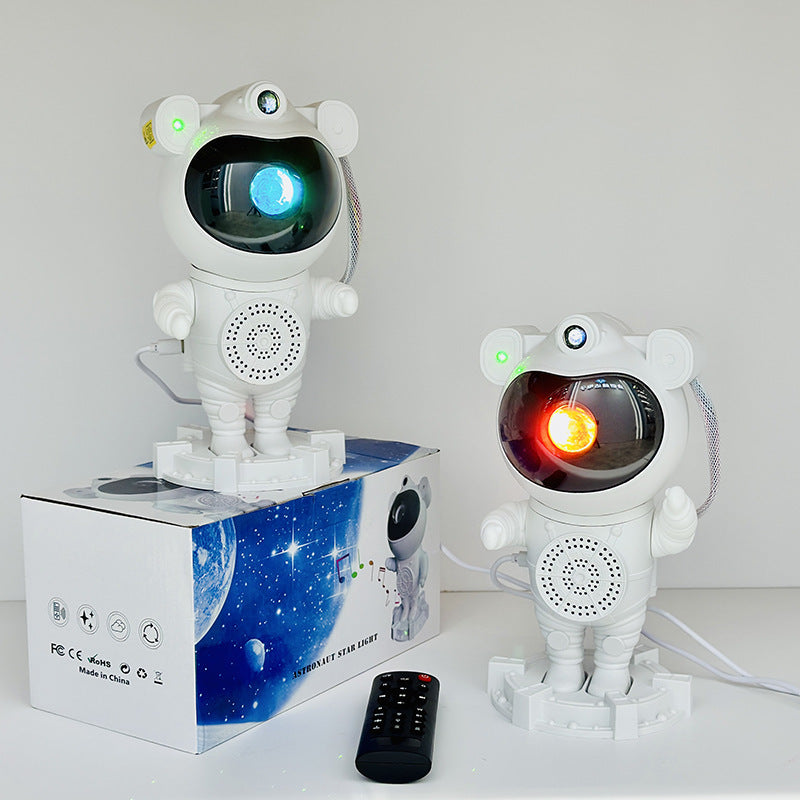 Astronauta Proyector con parlante Bluetooth + mini lámpara de regalo
